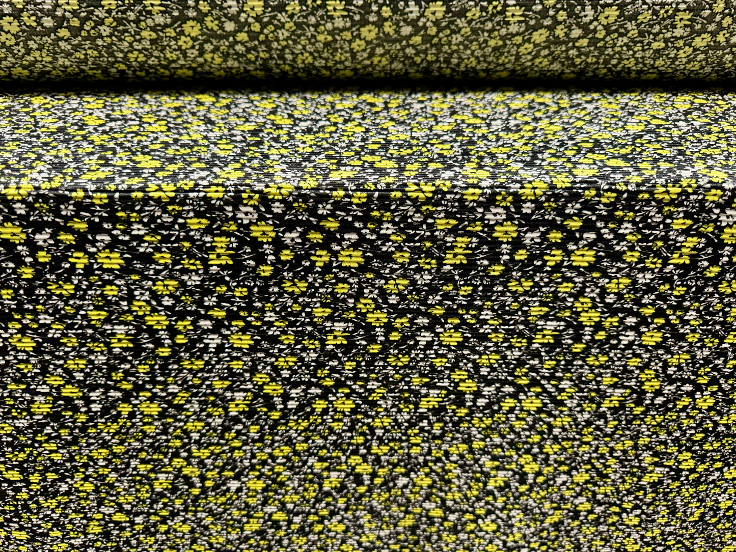 Stretch plissé pleated dress fabric, per metre - ditsy flower print - black & yellow