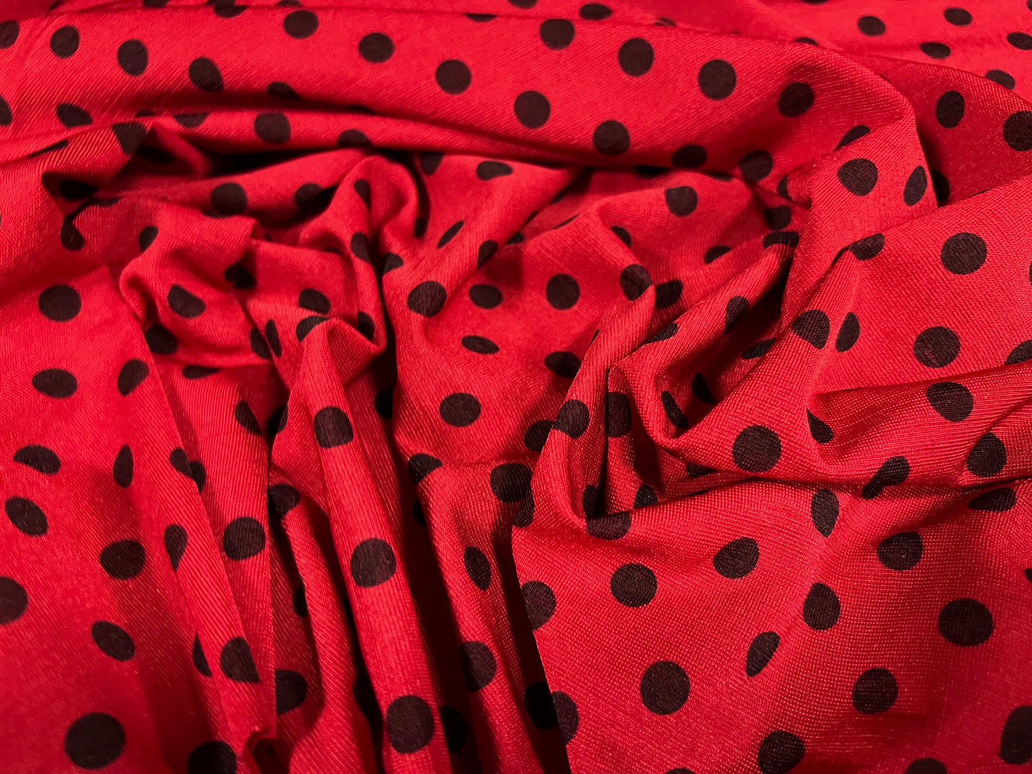 Finely textured stretch spandex single jersey fabric, per metre - ladybug print - red & black spot