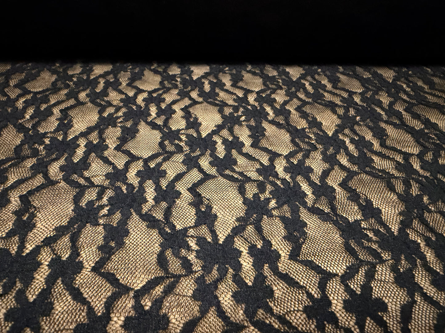 Stretch spandex lace fabric, per metre - stylised daisies - black