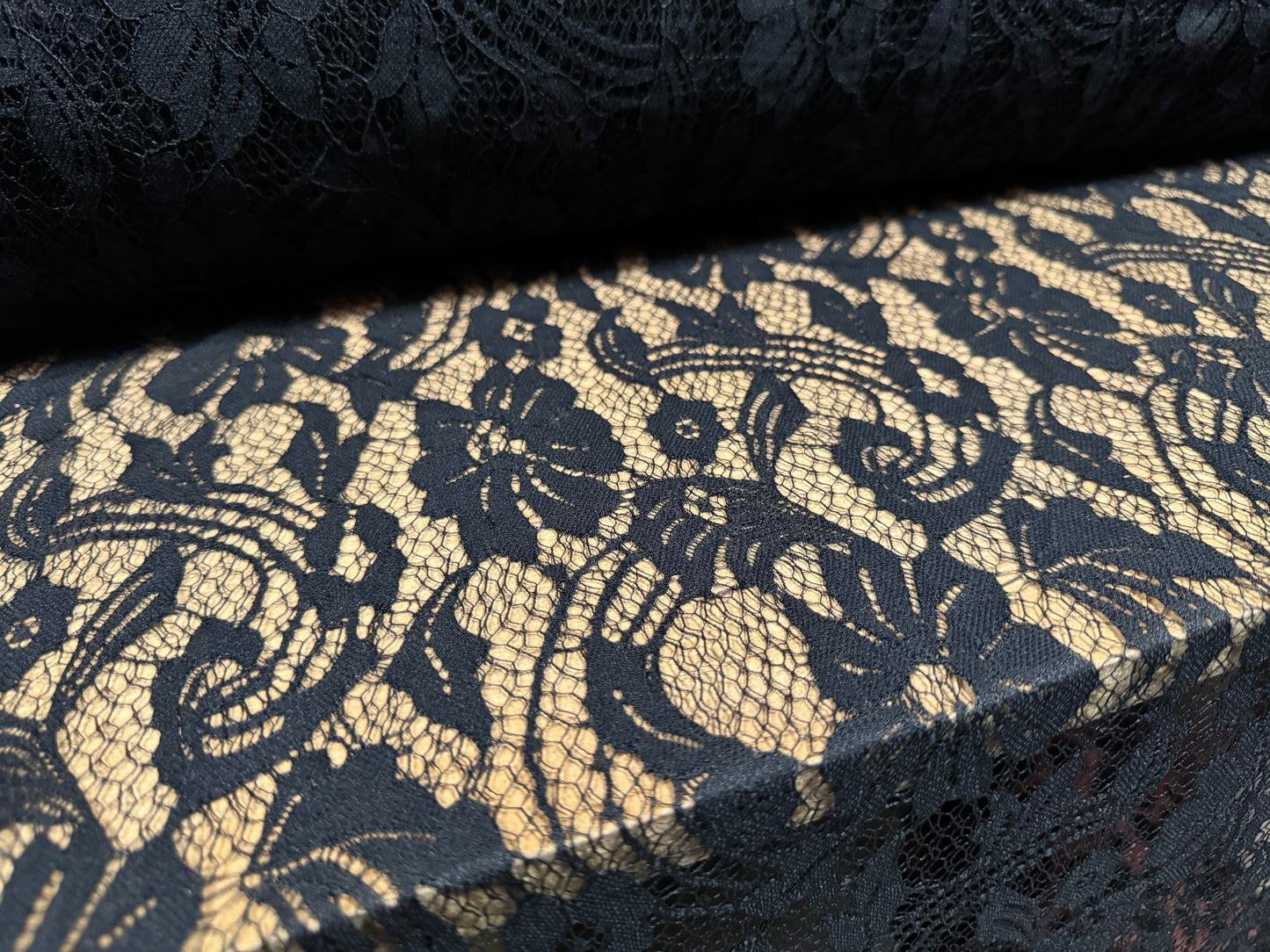 Lace dress fabric, per metre - stylised flowers & leaves - black