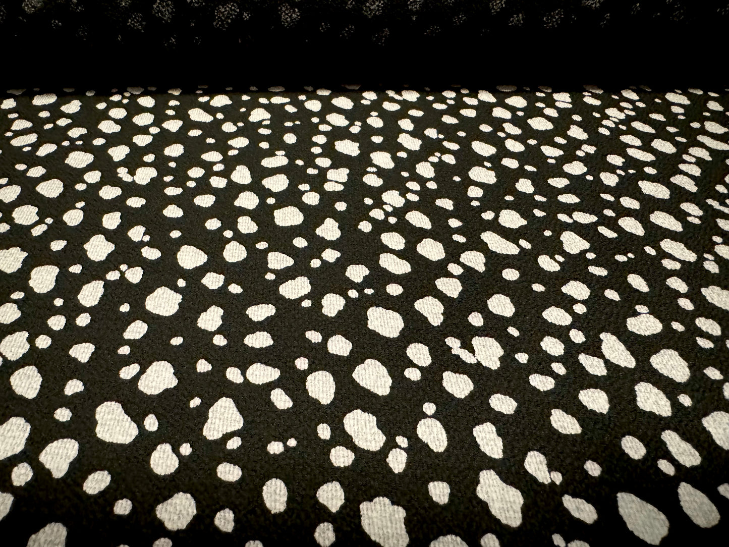 Pebble crepe woven dress fabric, per mere - Dalmatian animal print - black & putty