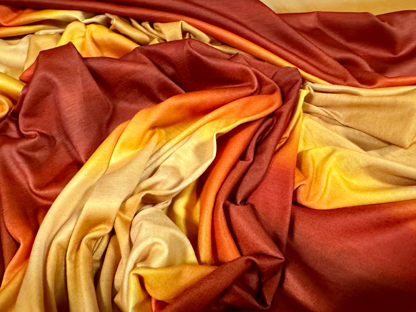 Soft handle stretch single jersey fashion fabric, per metre - ombré sunset print - orange & amber