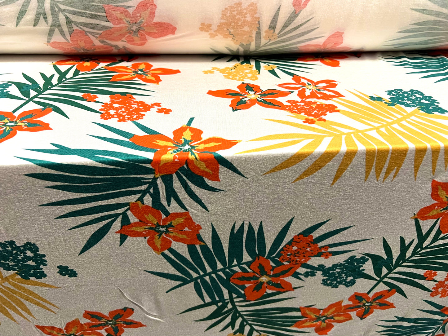 Viscose spandex stretch jersey fabric, per metre - Hawaiian tropical flower print - ivory green & orange