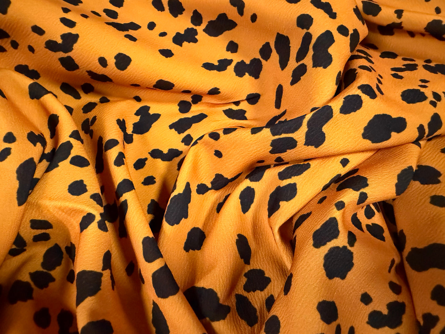 Sateen back crepe woven fashion fabric, per metre - Dalmatian print - honey