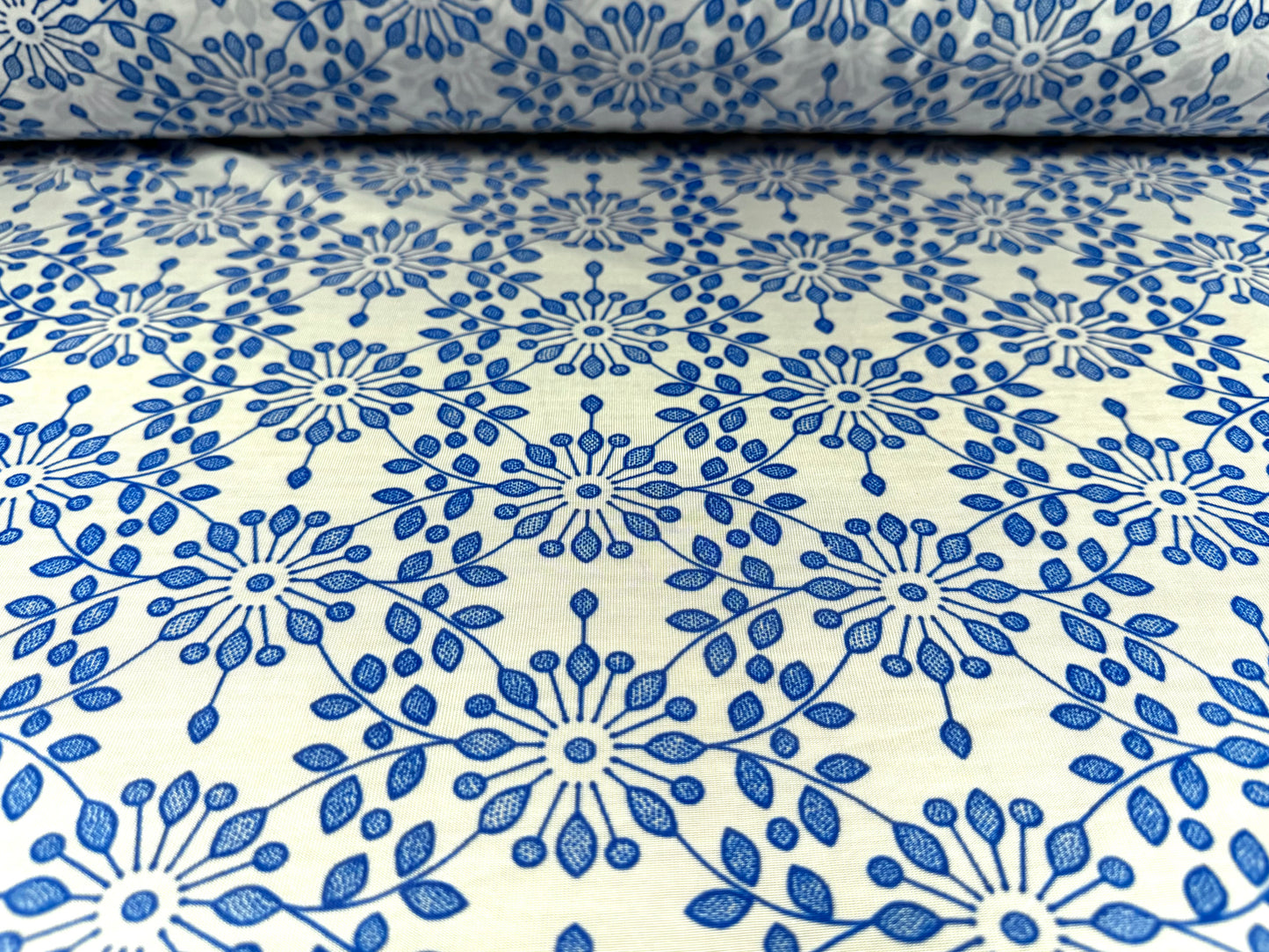 Angelique lightweight sateen jersey fabric, per metre - stylised flower print - white & cobalt blue