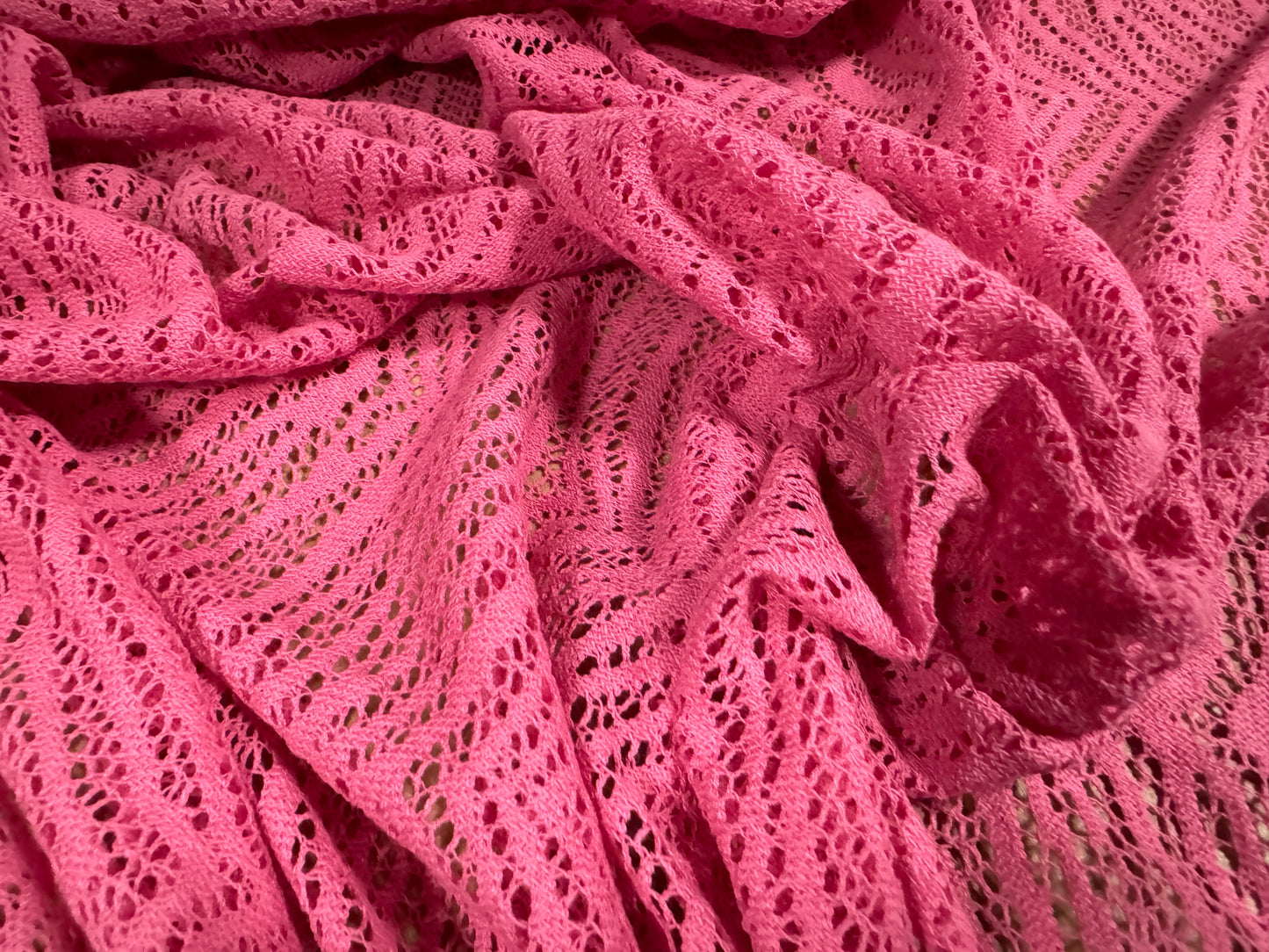 Crochet knit jersey fabric, per metre - stylised zebra design - pink