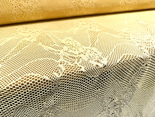 Stretch fishnet jersey fabric with floral design, per metre - yellow