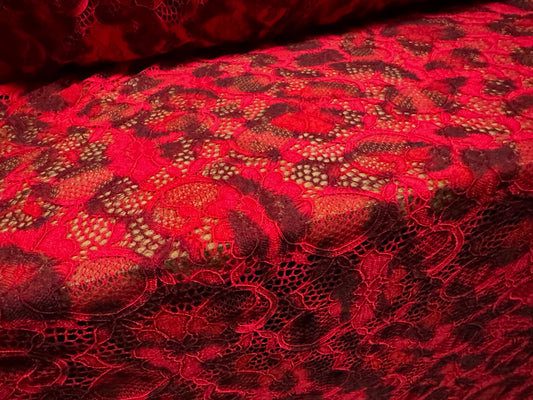 Stretch lace dress fabric with scalloped selvedge, per metre - leopard animal print - red & black