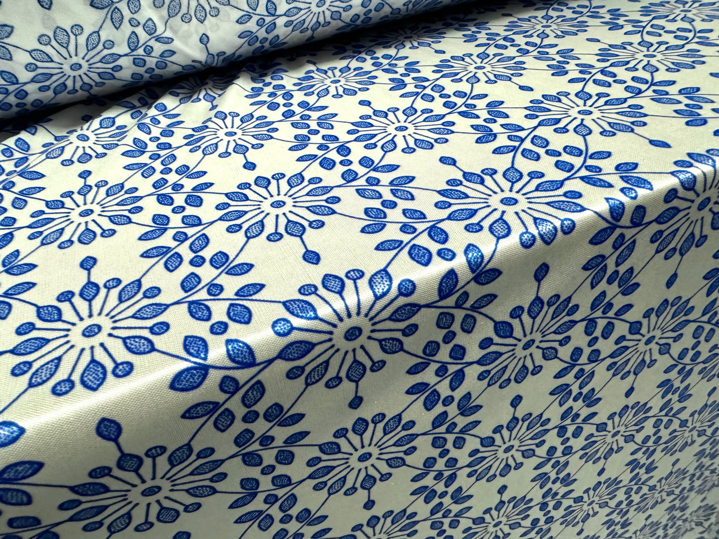 Stretch satin jersey fabric, per metre - stylised flower print - white & cobalt blue