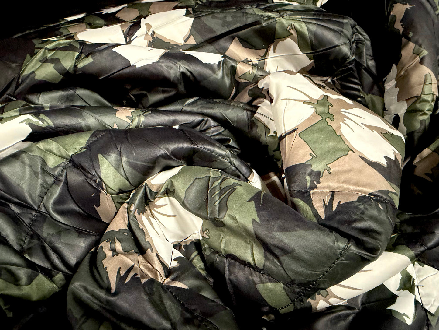 Quilted double sided fabric, per metre - stylised floral print - khaki beige & black