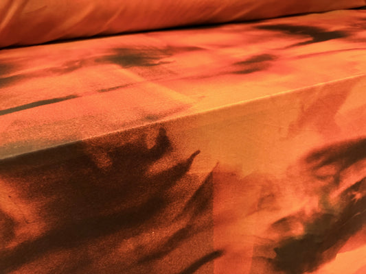 Power mesh net stretch spandex fabric, per metre - sunset shadows print - orange