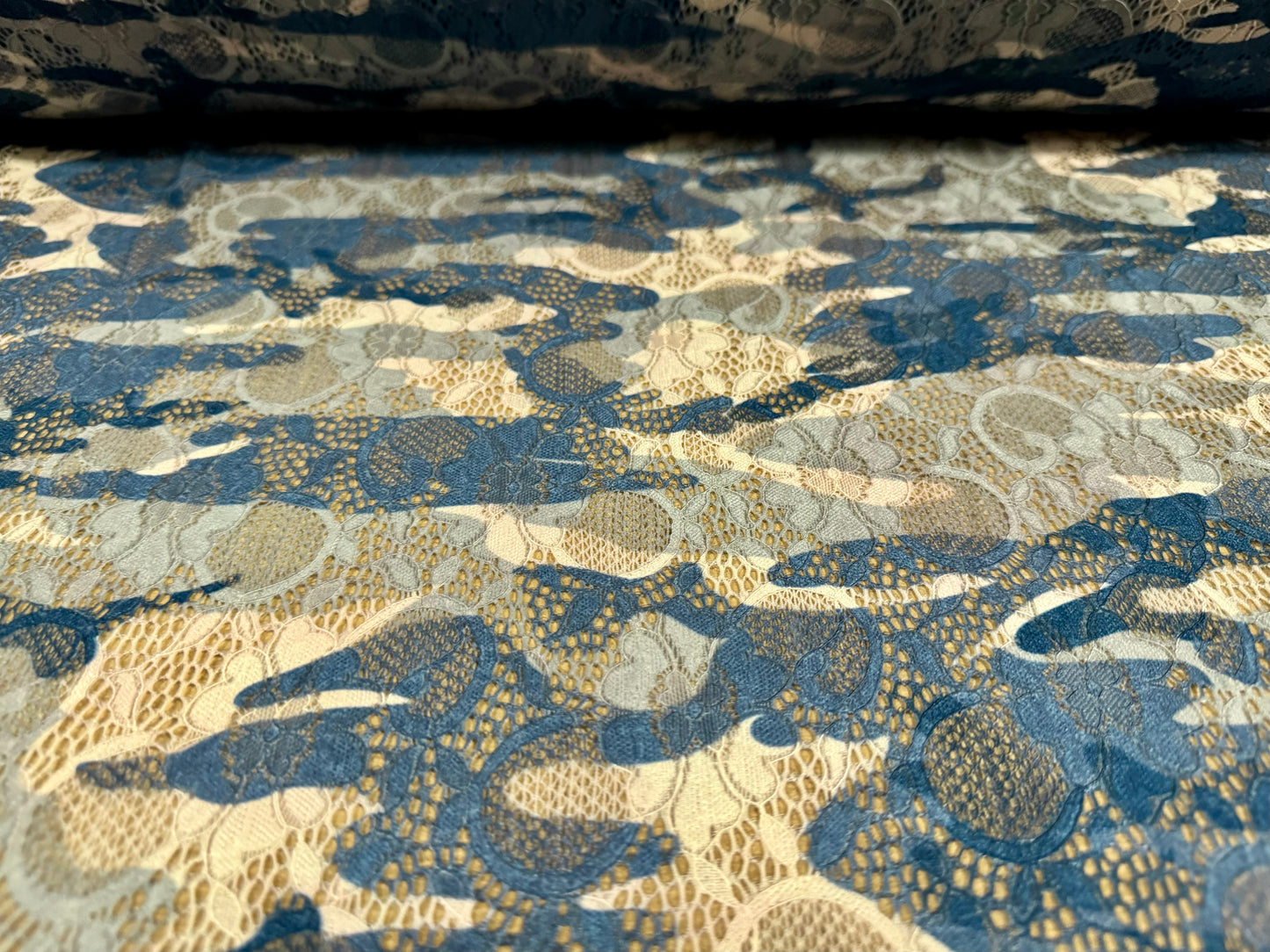 Stretch lace dress fabric with scalloped selvedge, per metre - camouflage print - sage green, blue & nude