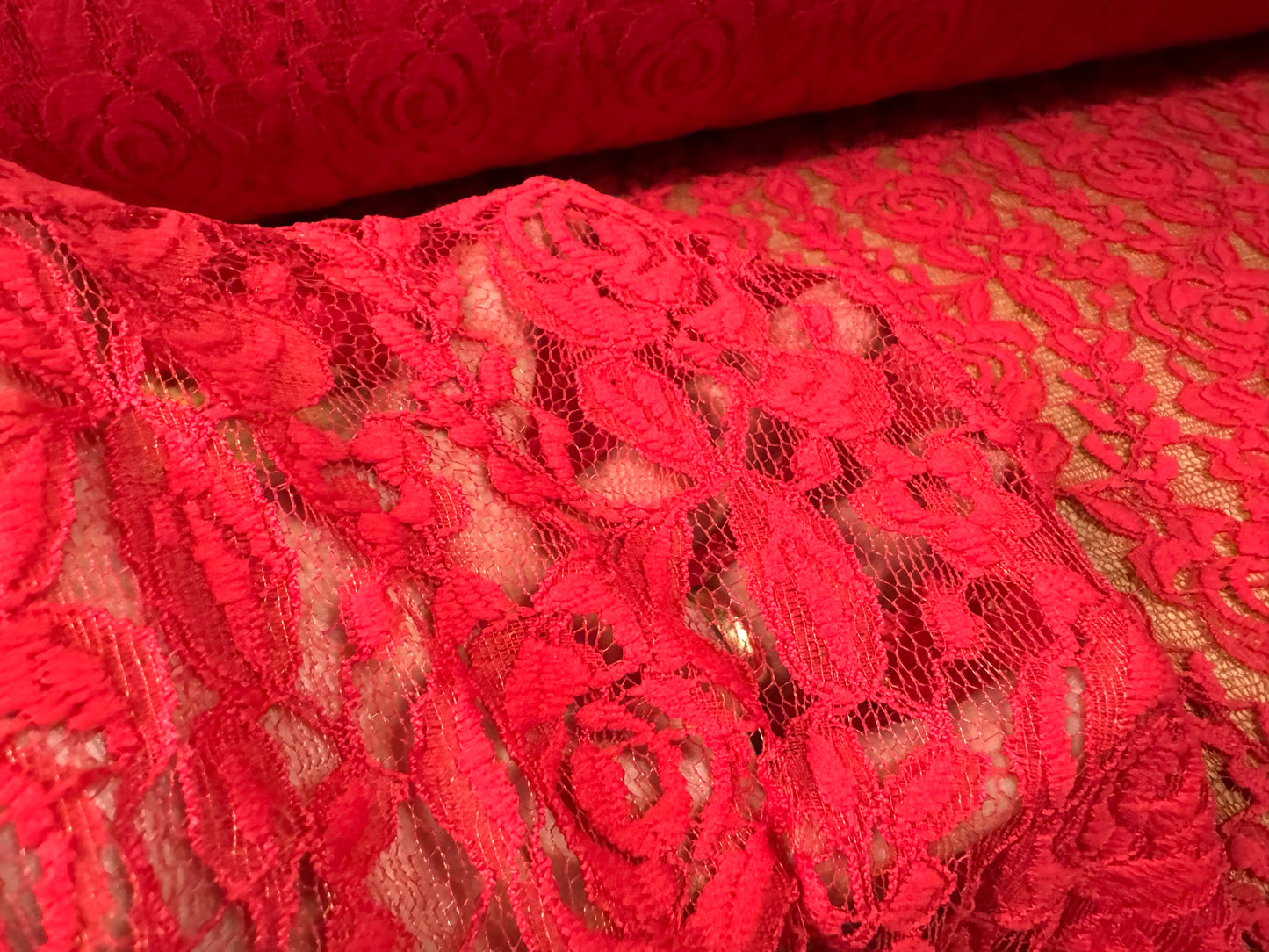 Stretch lace dress fabric, per metre - rambling rose floral design - red