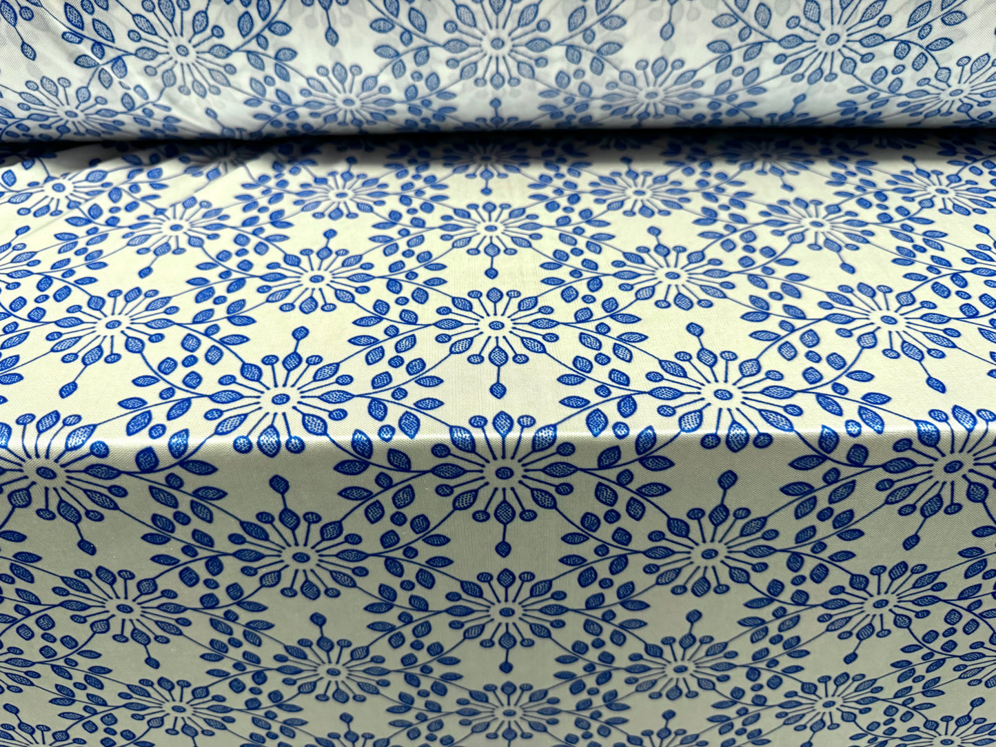 Stretch satin jersey fabric, per metre - stylised flower print - white & cobalt blue