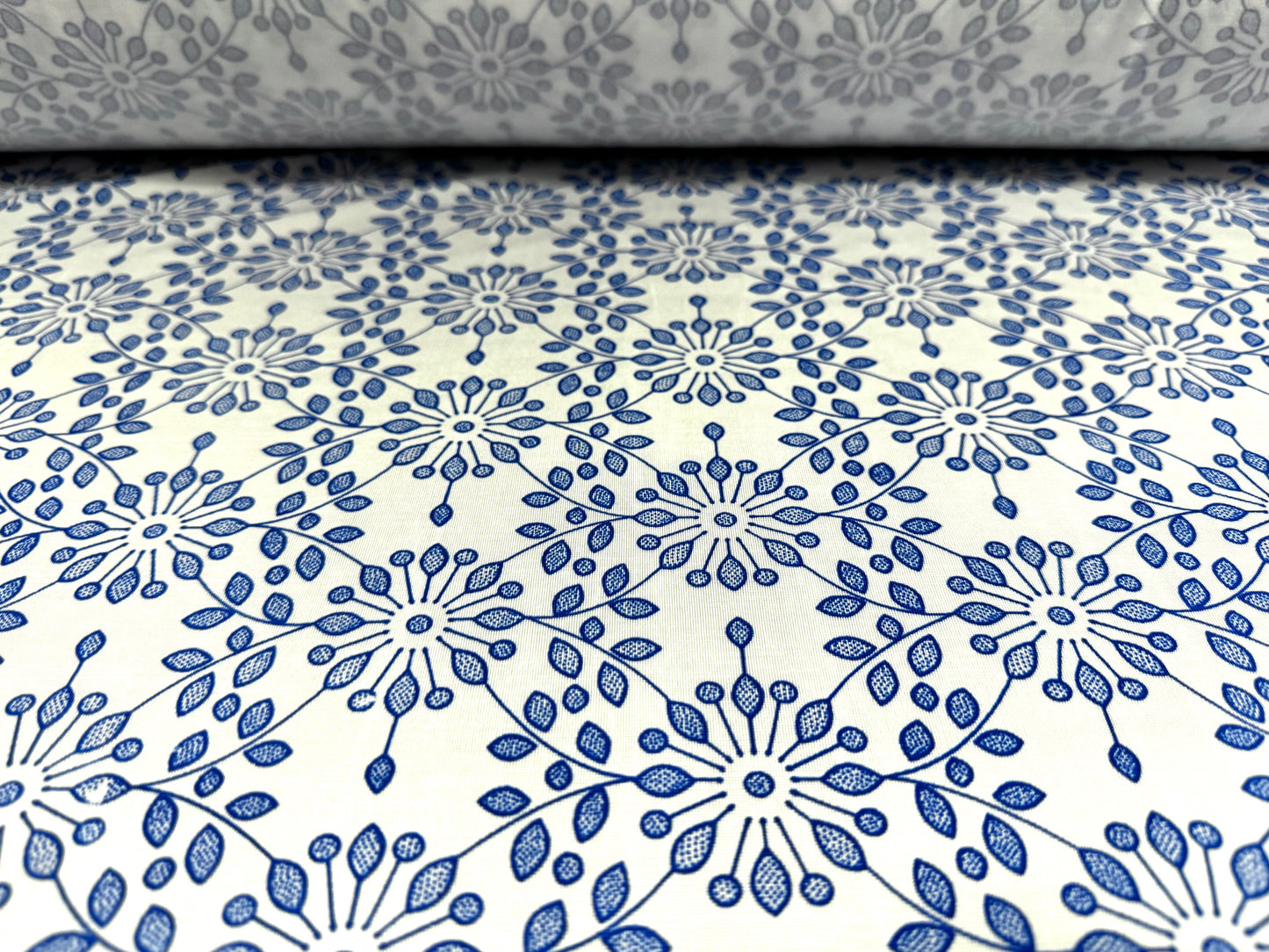 Finely textured stretch spandex single jersey fabric, per metre - stylised flower print - cobalt blue & white