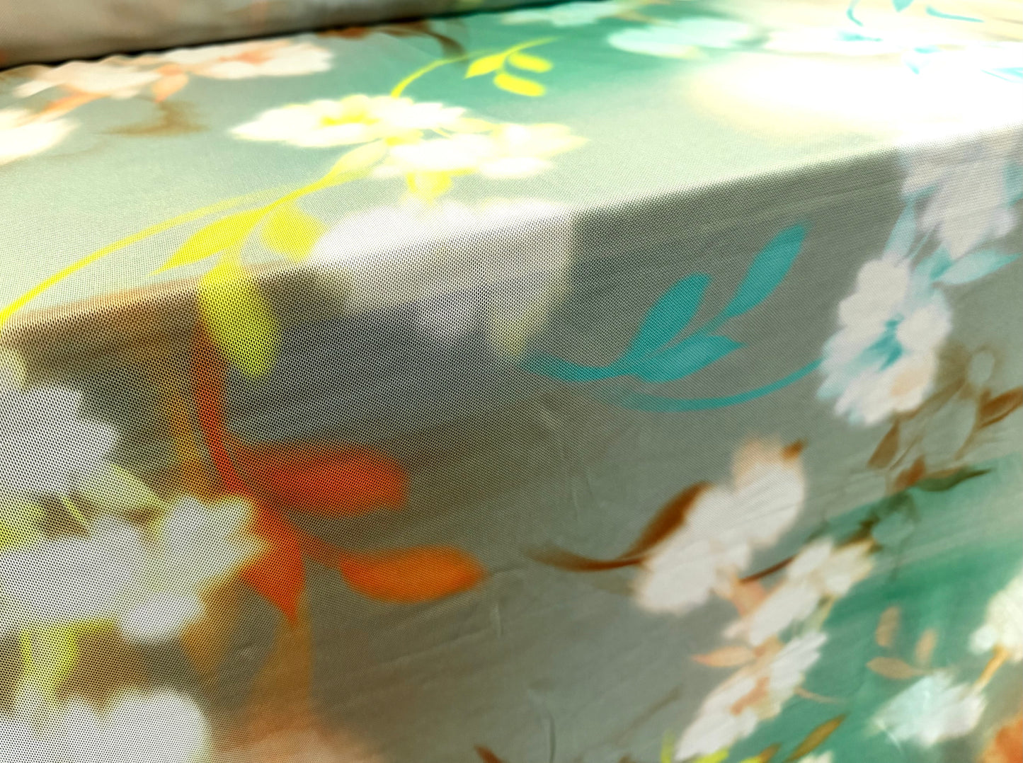 Power mesh net stretch spandex fabric, per metre - floral print - pastel jade