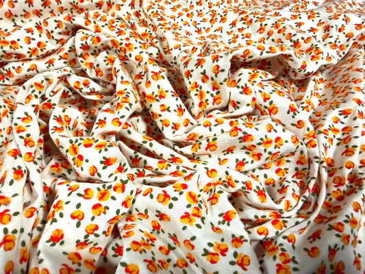Viscose spandex stretch jersey fabric, per metre - small ditsy flower print - orange & cream