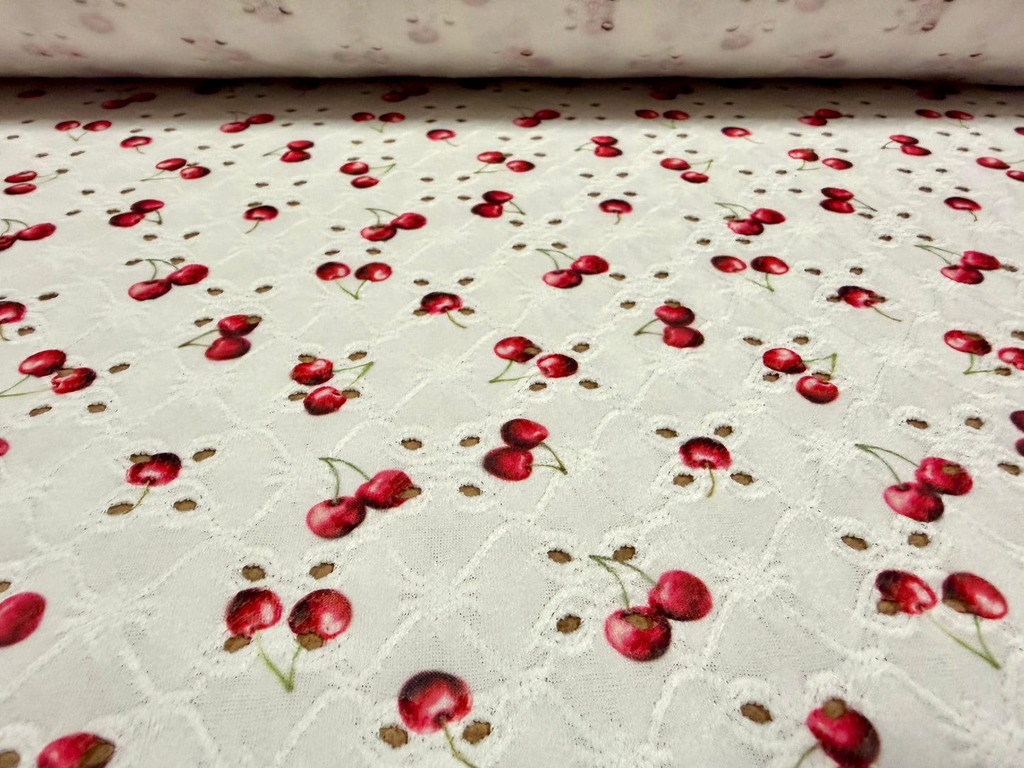 Broderie anglaise stretch spandex jersey fabric, per metre - cherry print - ivory & cerise