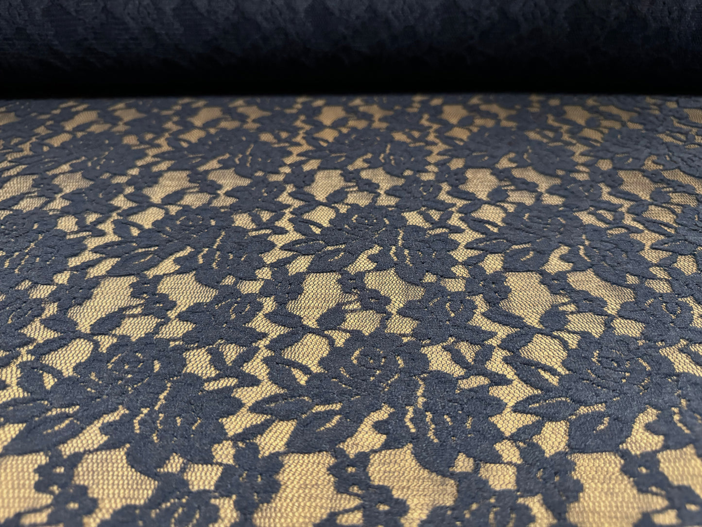 Soft stretch lace fabric, per metre - scalloped selvedge - floral rose - dark navy blue