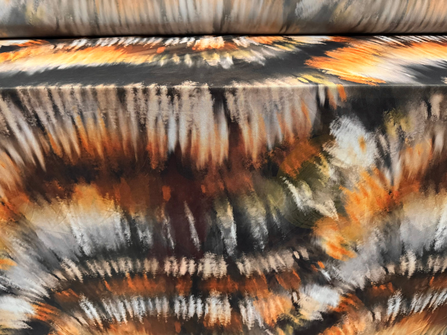 Power mesh net stretch spandex fabric, per metre - tie dye streak print - black orange and cream