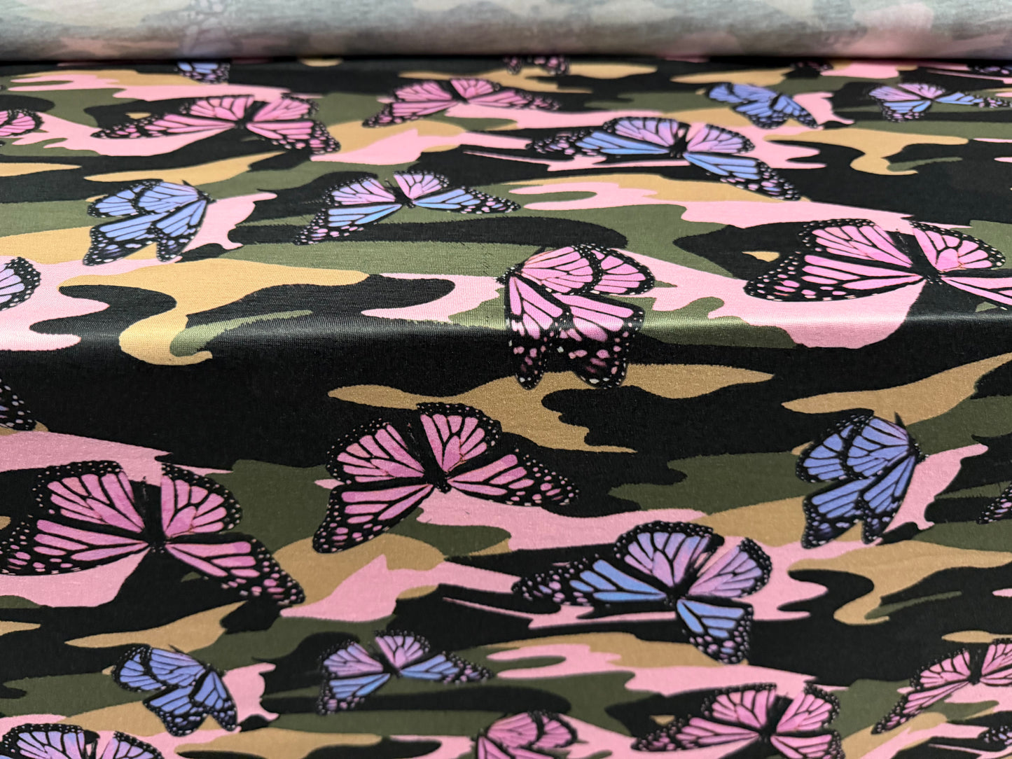 Soft handle stretch jersey fabric, per metre - butterfly camouflage print