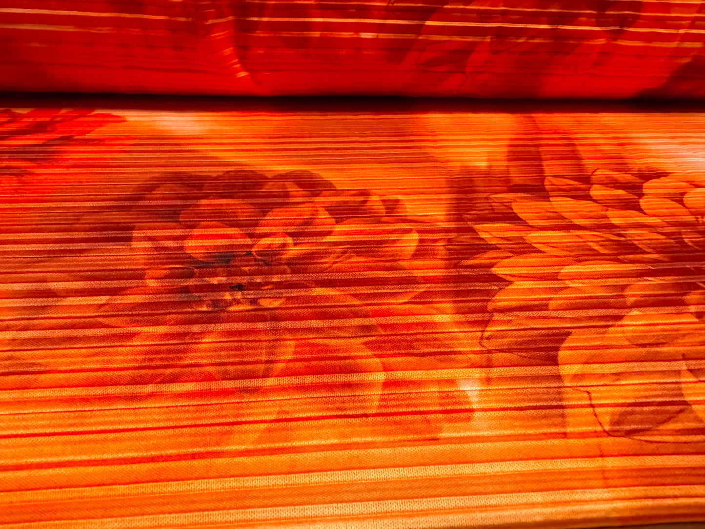 Stretch plissé pleated dress fabric, per metre - flower print - orange