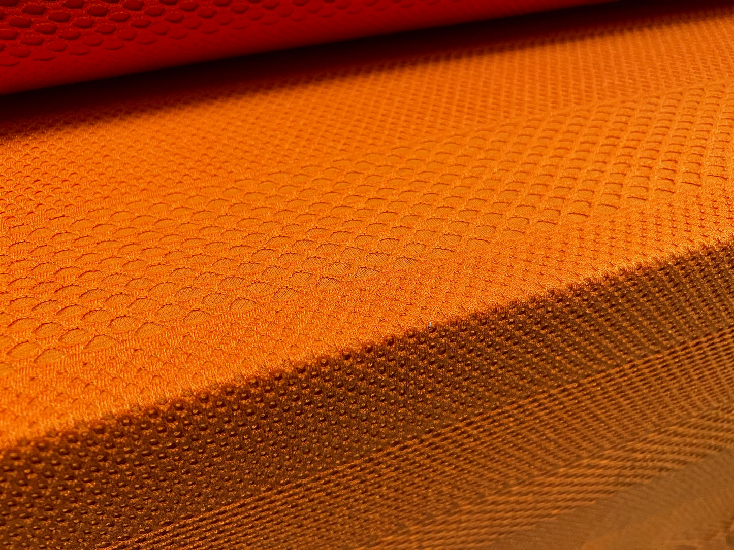 Bonded fishnet stretch spandex jersey fabric, per metre - orange on orange