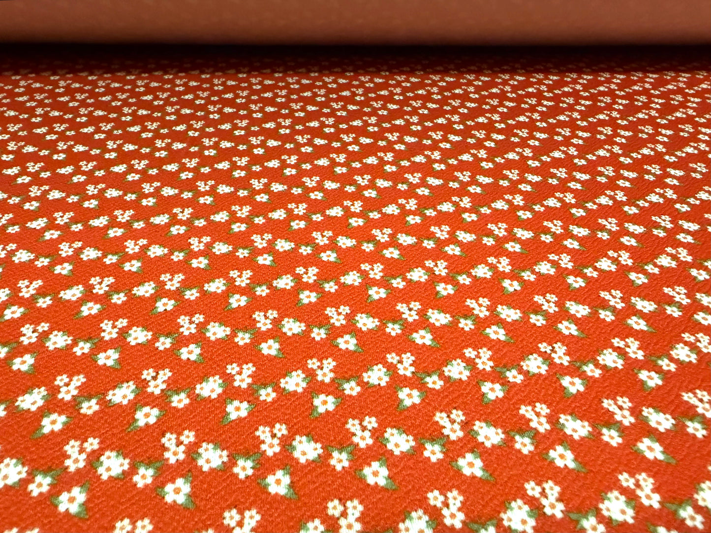 Waterfall textured scuba stretch jersey fabric, per metre - ditsy flower print - orange
