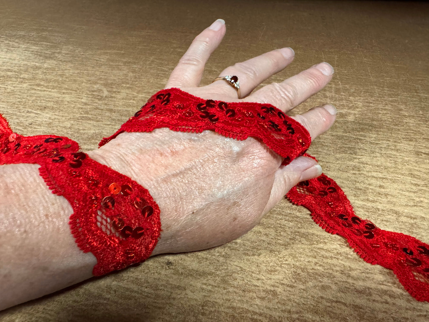 Scalloped lace edging trim fabric with sequins - stretch - red
