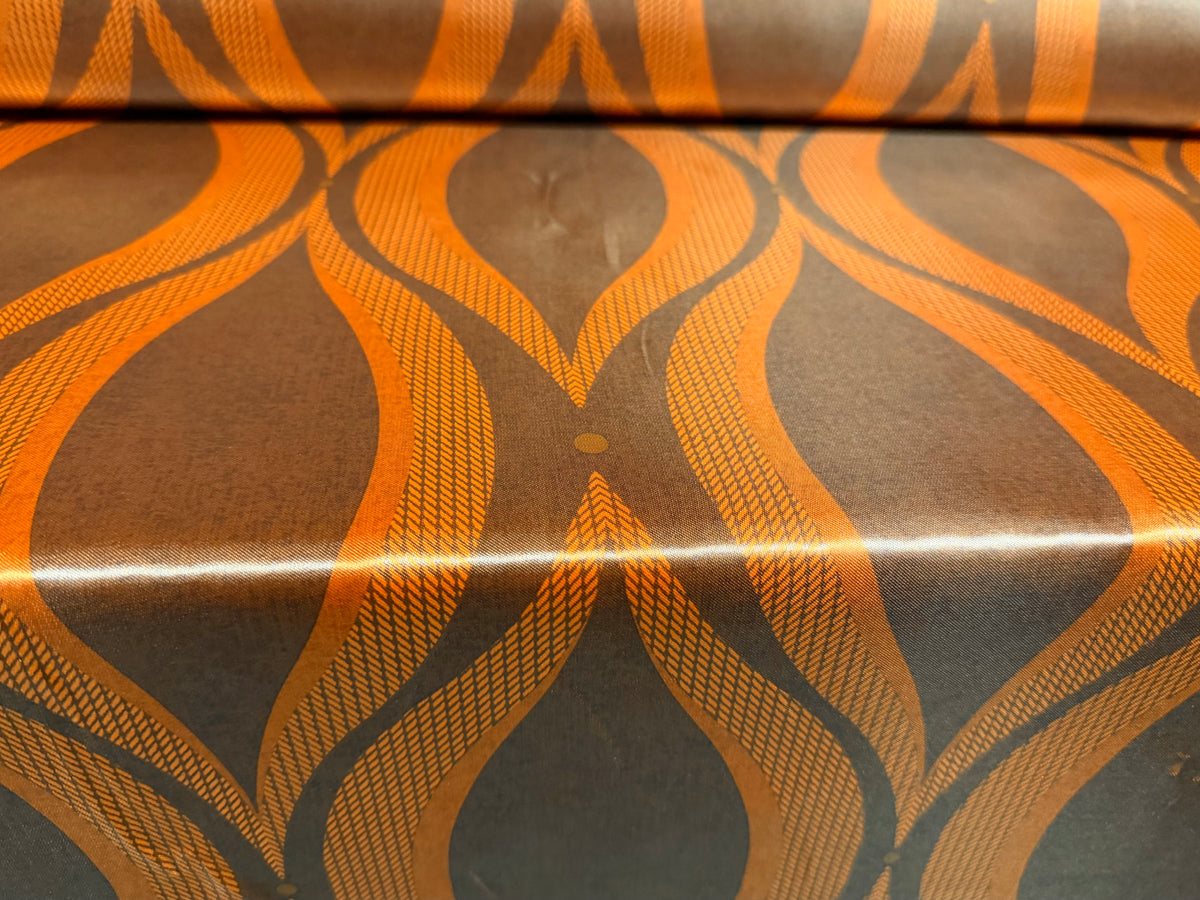 Satin woven dress fabric, per metre - teardrop print - orange & copper