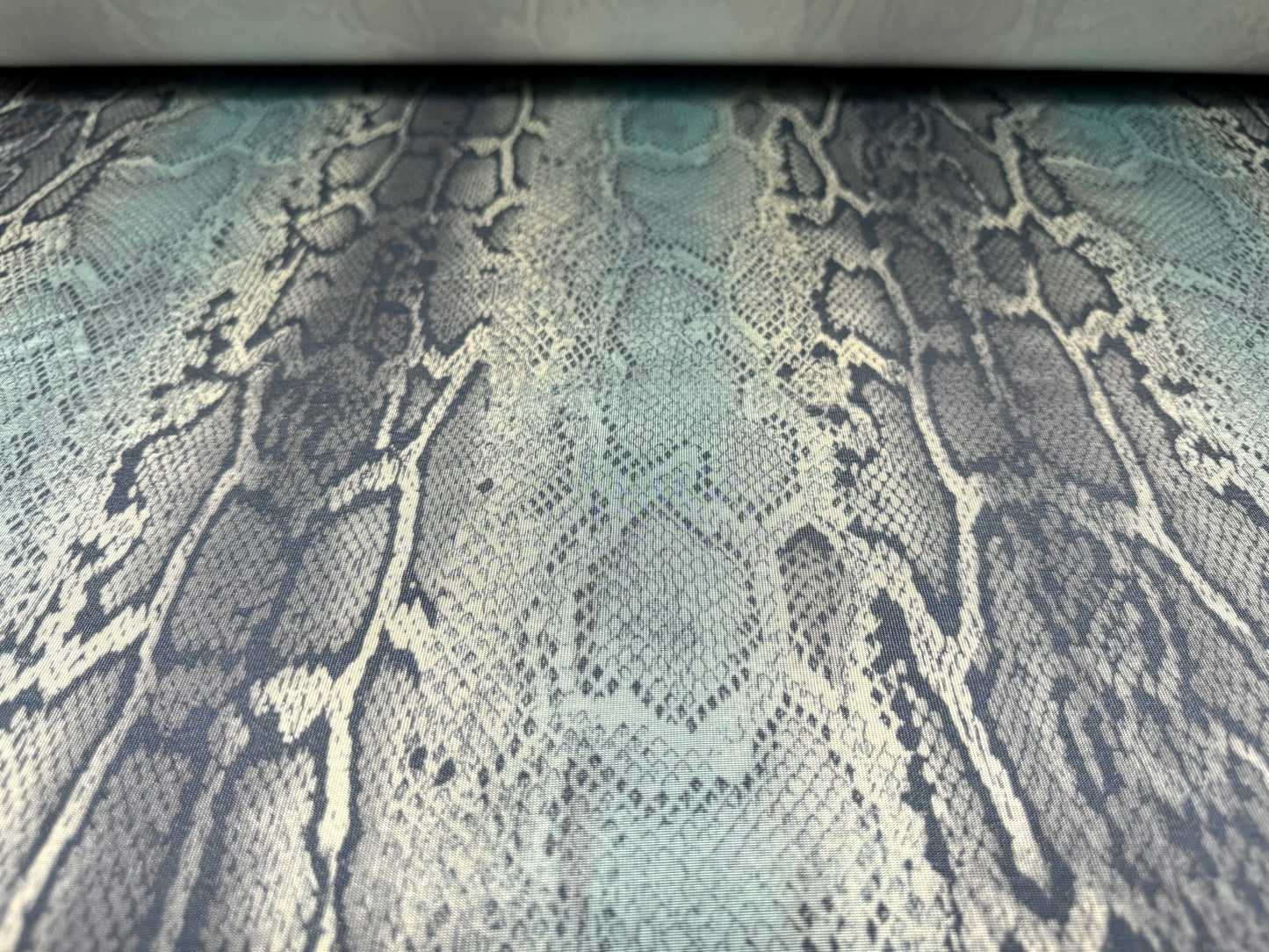 Soft touch stretch spandex single jersey fabric, per metre - snakeskin animal print - blue