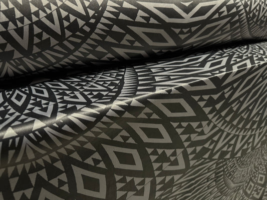 Ciré p.u. coated stretch single jersey fabric, per metre - tribal tattoo print - grey & black