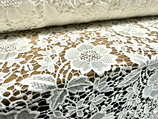 Cutwork embroidered couture lace dress fabric with decorative border, per metre - floral - ivory