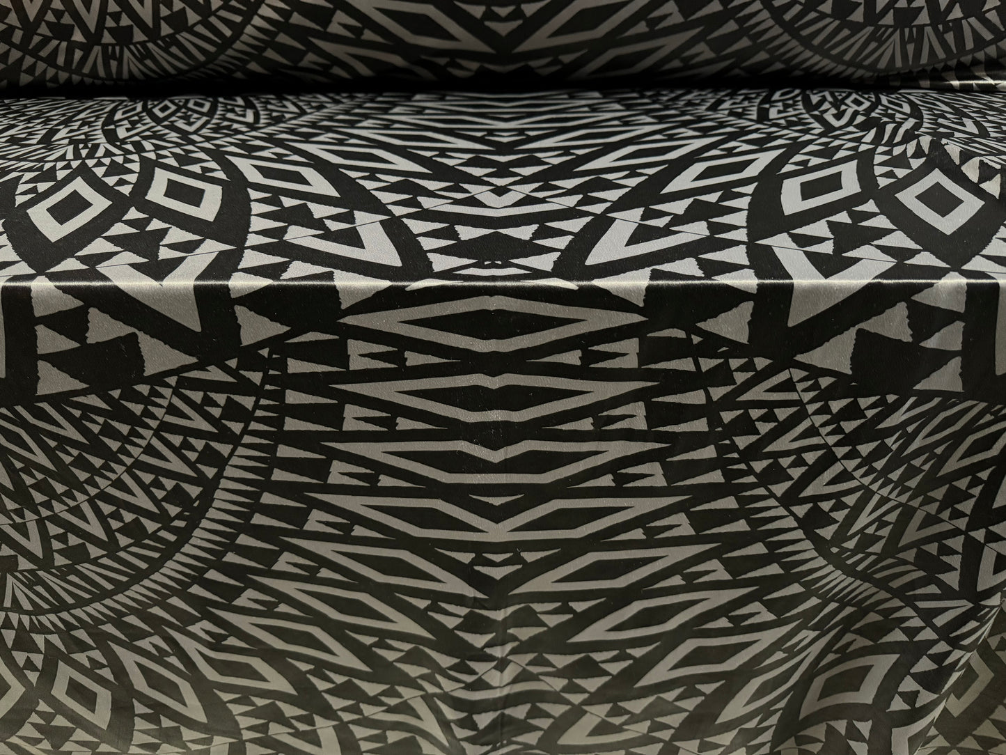 Ciré p.u. coated stretch single jersey fabric, per metre - tribal tattoo print - grey & black