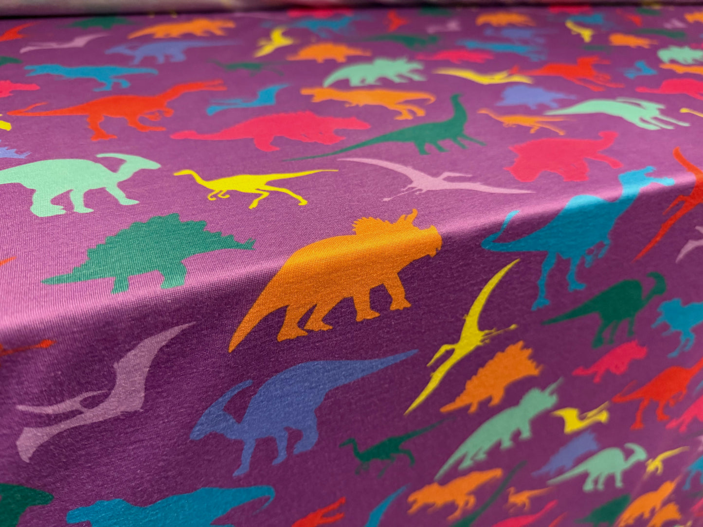 Soft handle single jersey fabric, per metre - dinosaur print - purple