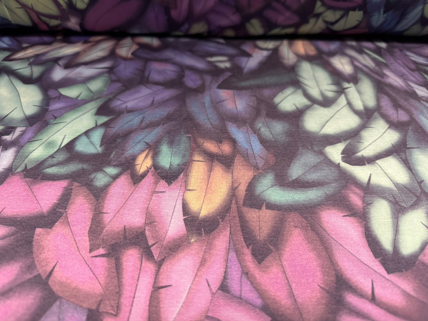 Soft touch stretch spandex single jersey fabric, per metre - stylised leaves print - multicolour