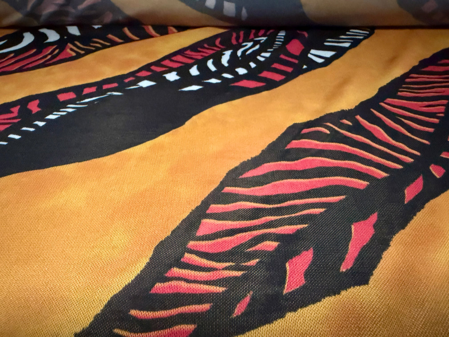Power mesh net stretch spandex fabric, per metre - tribal print - amber
