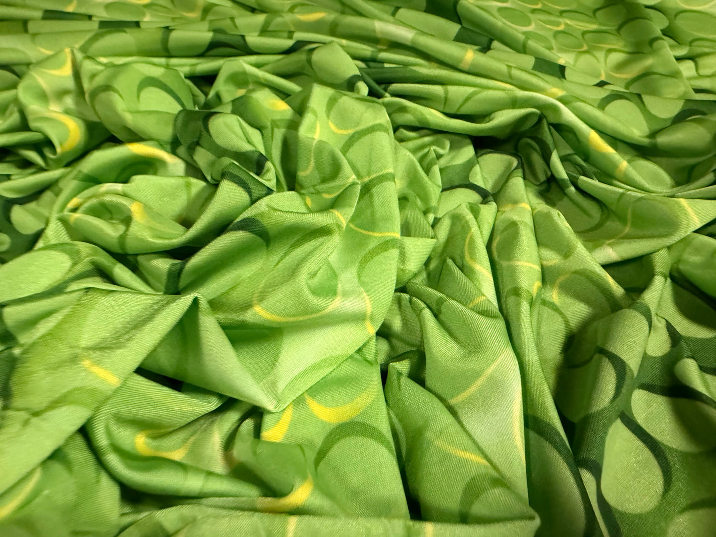 Soft touch stretch spandex single jersey fabric, per metre - cascading circles print - green