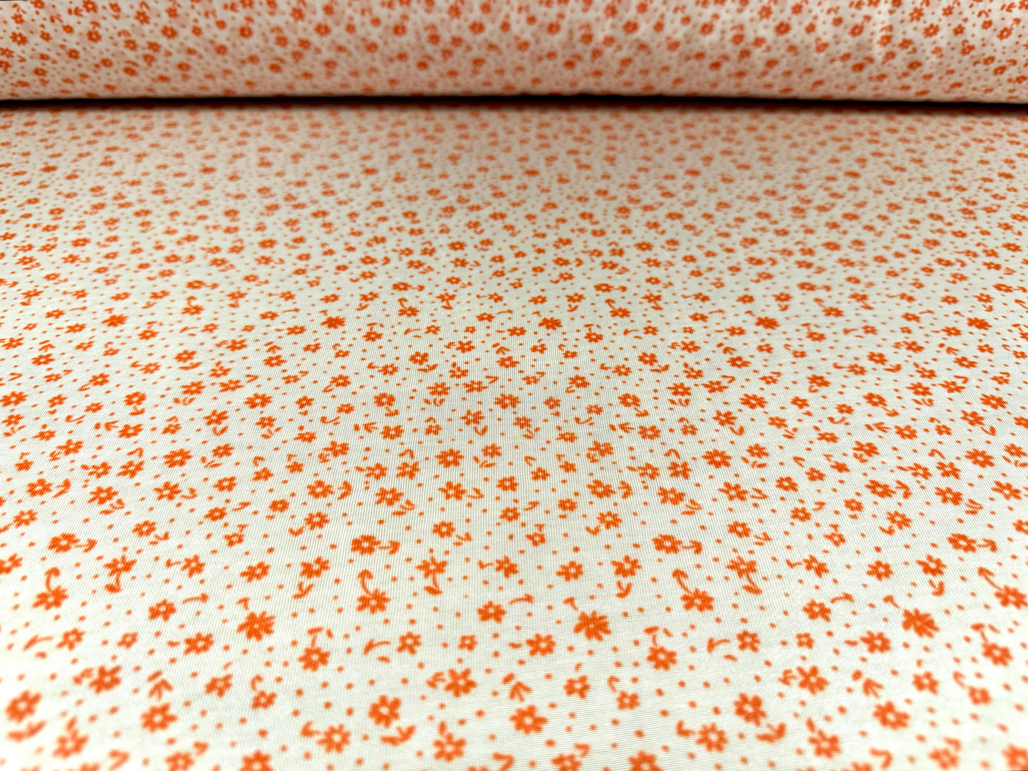 Angelique lightweight sateen jersey fabric, per metre - ditsy floral print - orange & white