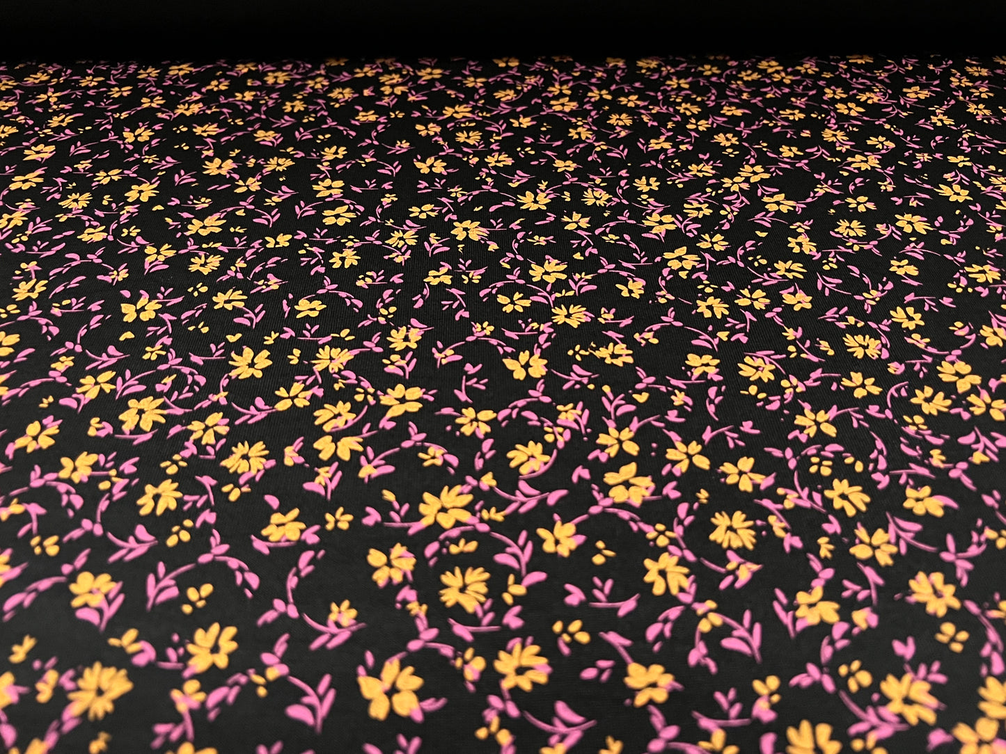 Viscose spandex stretch single jersey fabric, per metre - ditsy flower print - black magenta & saffron