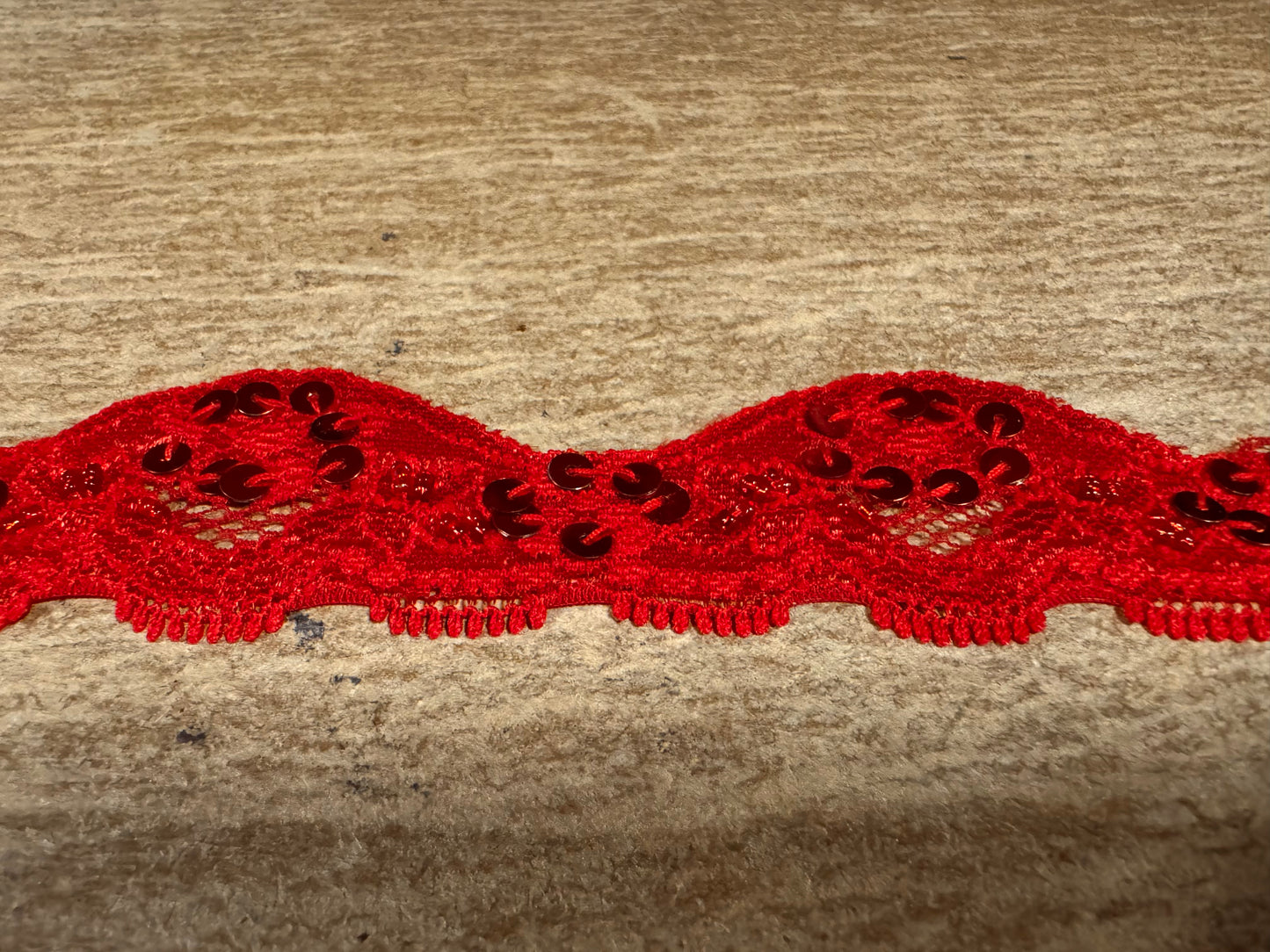 Scalloped lace edging trim fabric with sequins - stretch - red