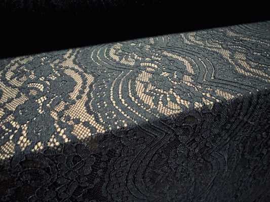 Stretch lace dress fabric, per metre - scalloped selvedge - floral wave - black