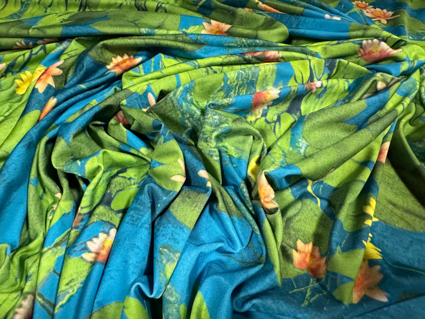 Soft touch stretch spandex single jersey fabric, per metre - water lily print - blue & green