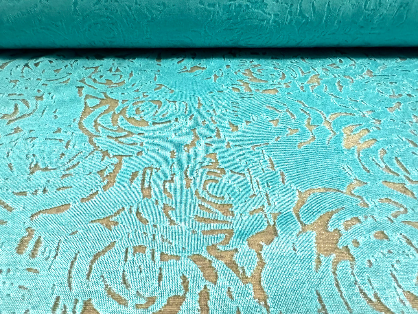 Rose design burnout single jersey dress fabric, per metre - turquoise