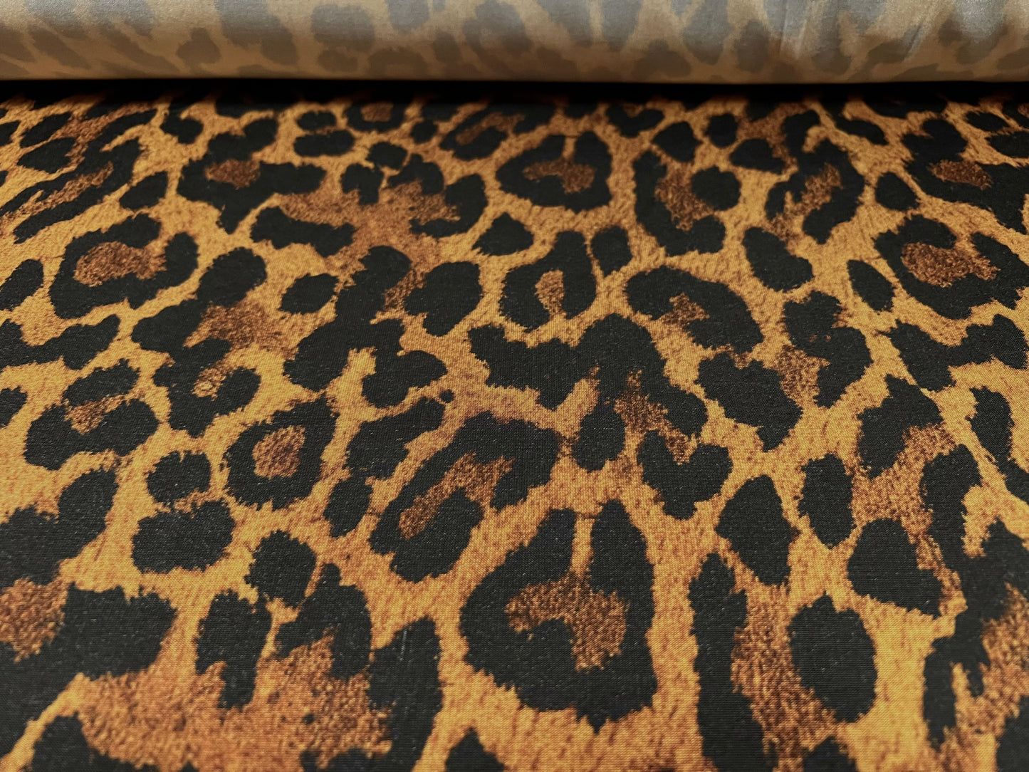 Stretch spandex single jersey fashion fabric, per metre - Jaguar jungle animal print - gold brown