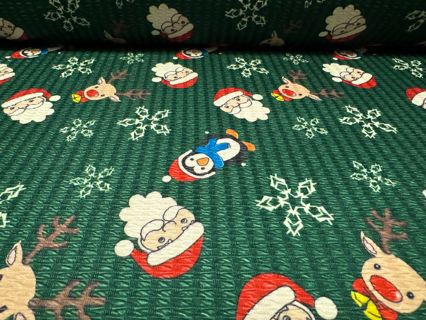 Stretch spandex jacquard jersey fabric, per metre - Santa Claus & Reindeer Christmas print - bottle green