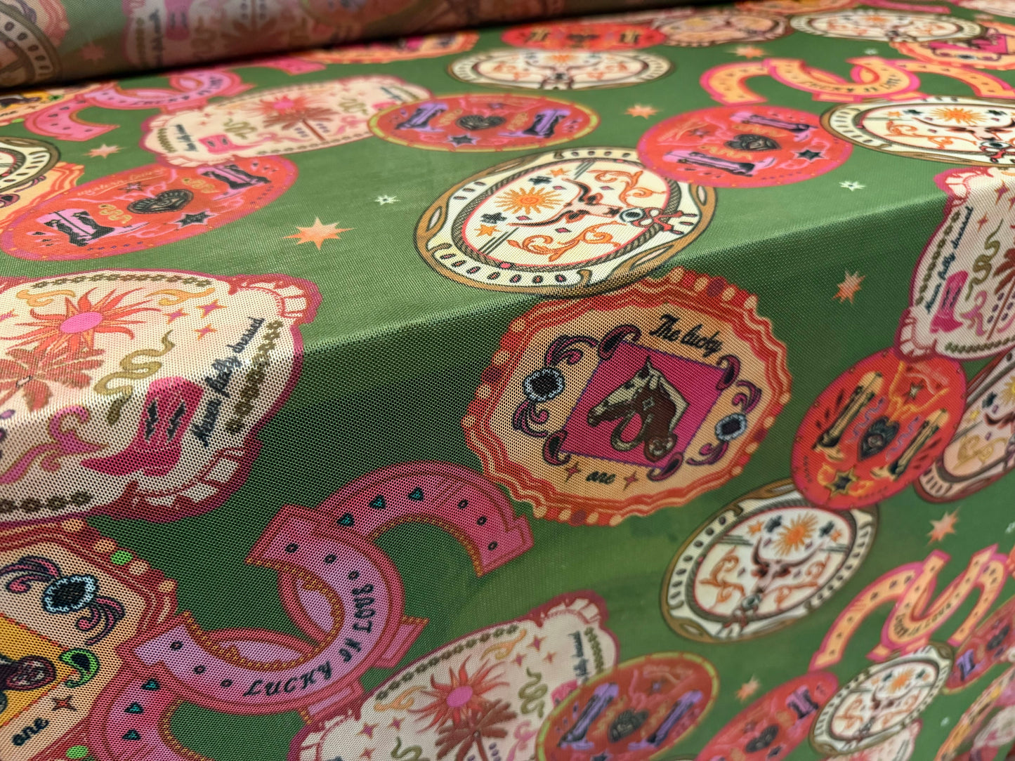Power mesh net stretch spandex fabric, per metre - lucky horseshoe print - pink & olive green