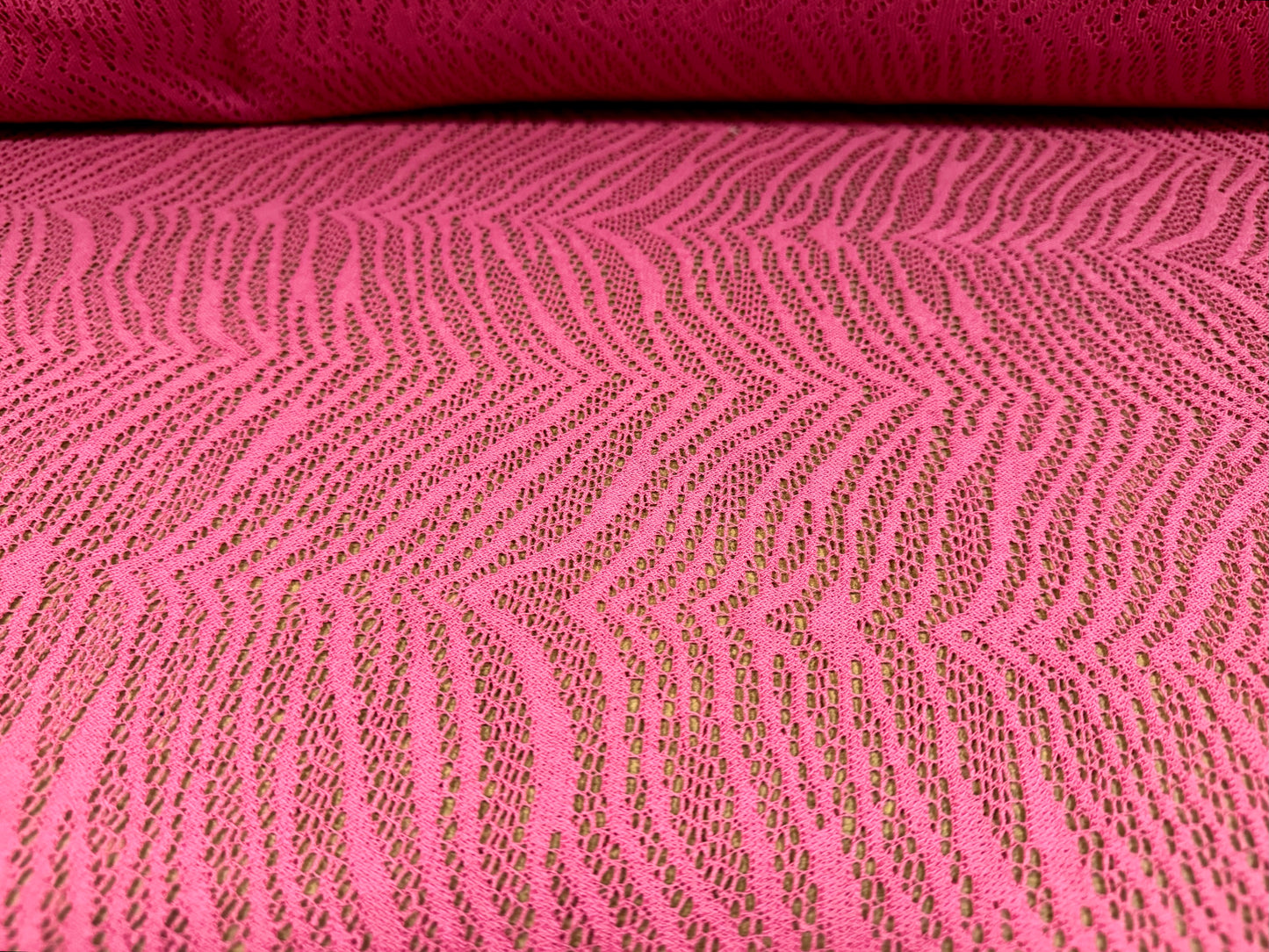 Crochet knit jersey fabric, per metre - stylised zebra design - pink