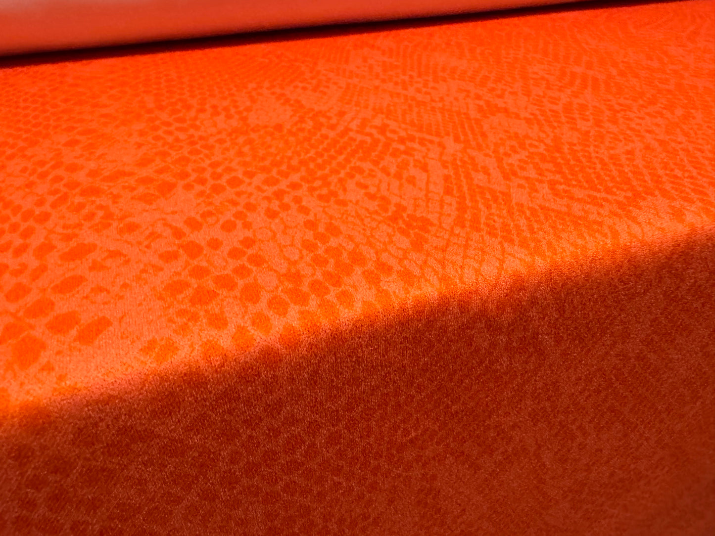 Scuba crepe stretch spandex jersey dress fabric, per metre - snakeskin print - orange