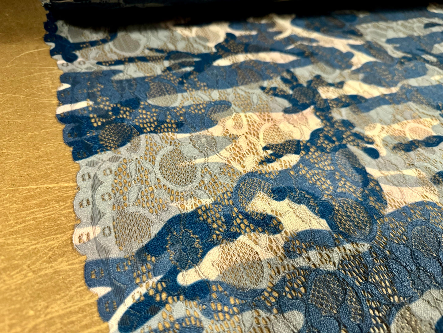 Stretch lace dress fabric with scalloped selvedge, per metre - camouflage print - sage green, blue & nude